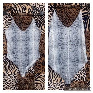 ~grey snake print bodysuit, size small